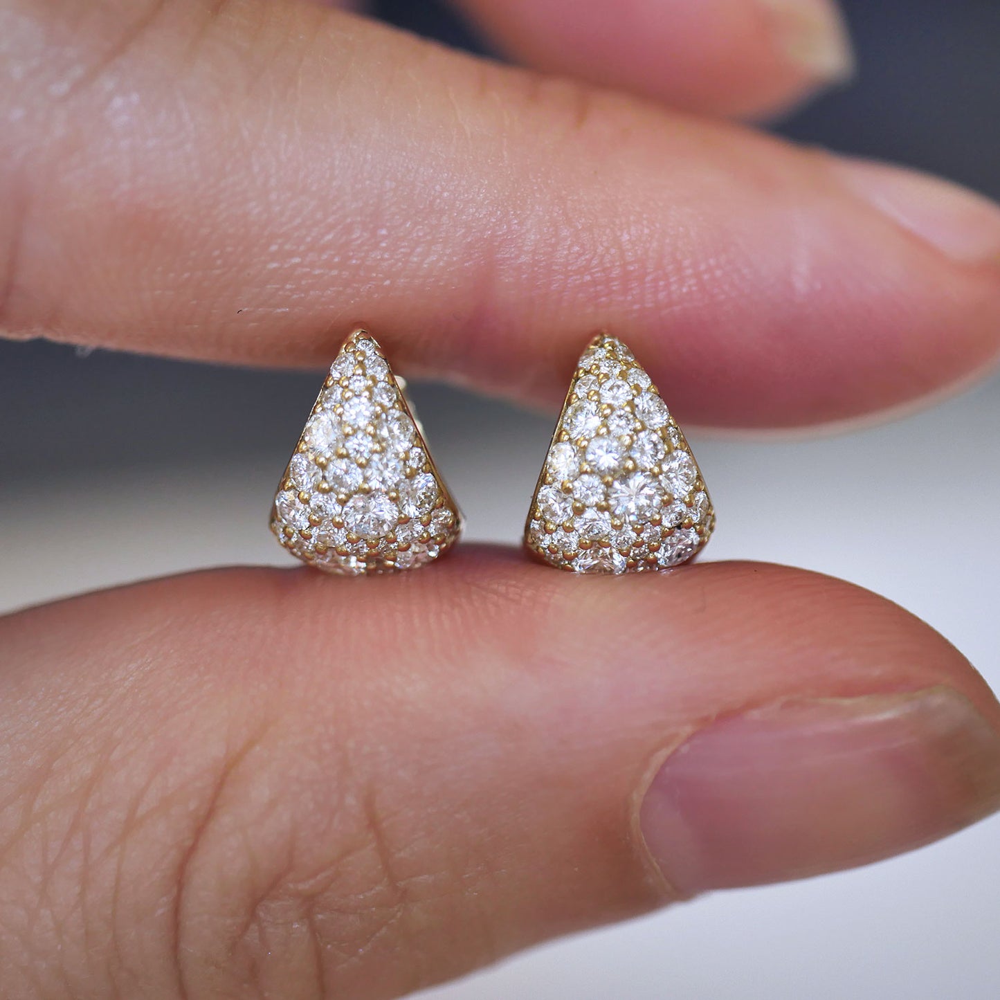 Teardrop-shaped cobblestone diamond earrings.