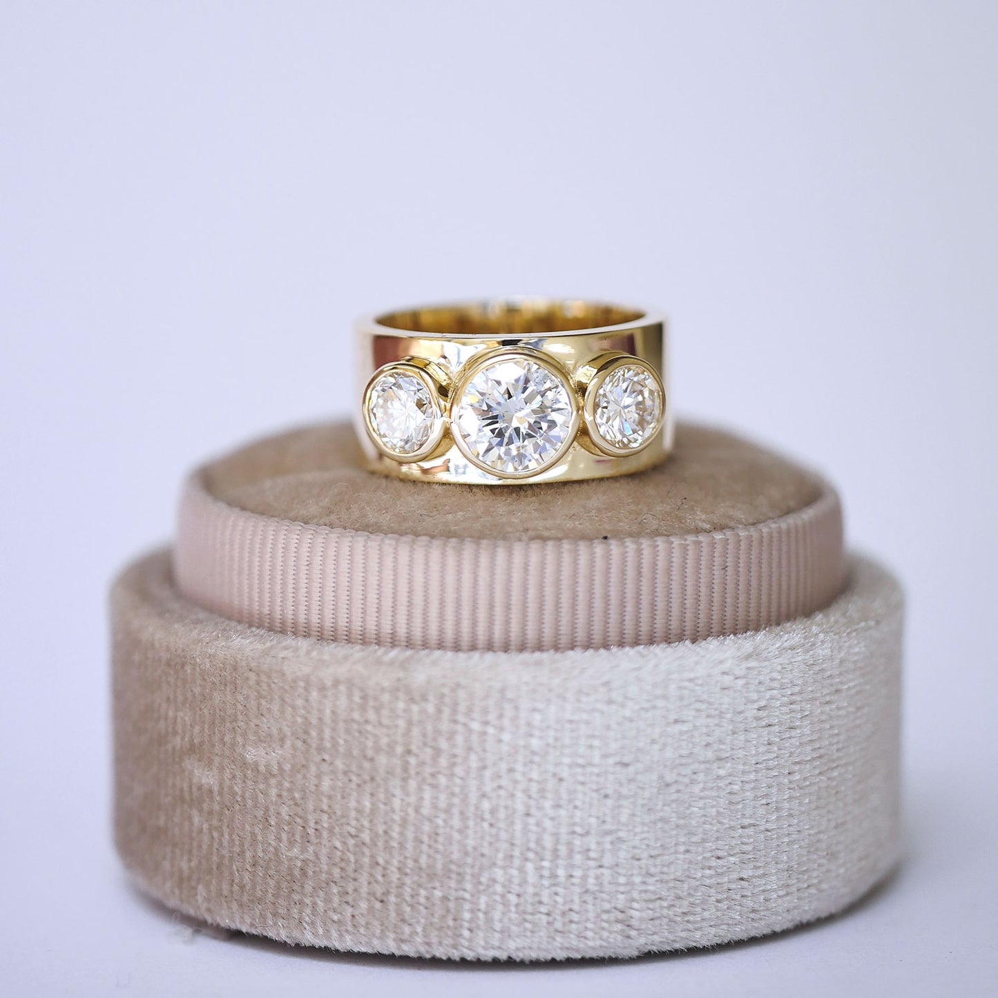 Custom Wide Bezel Three Stone