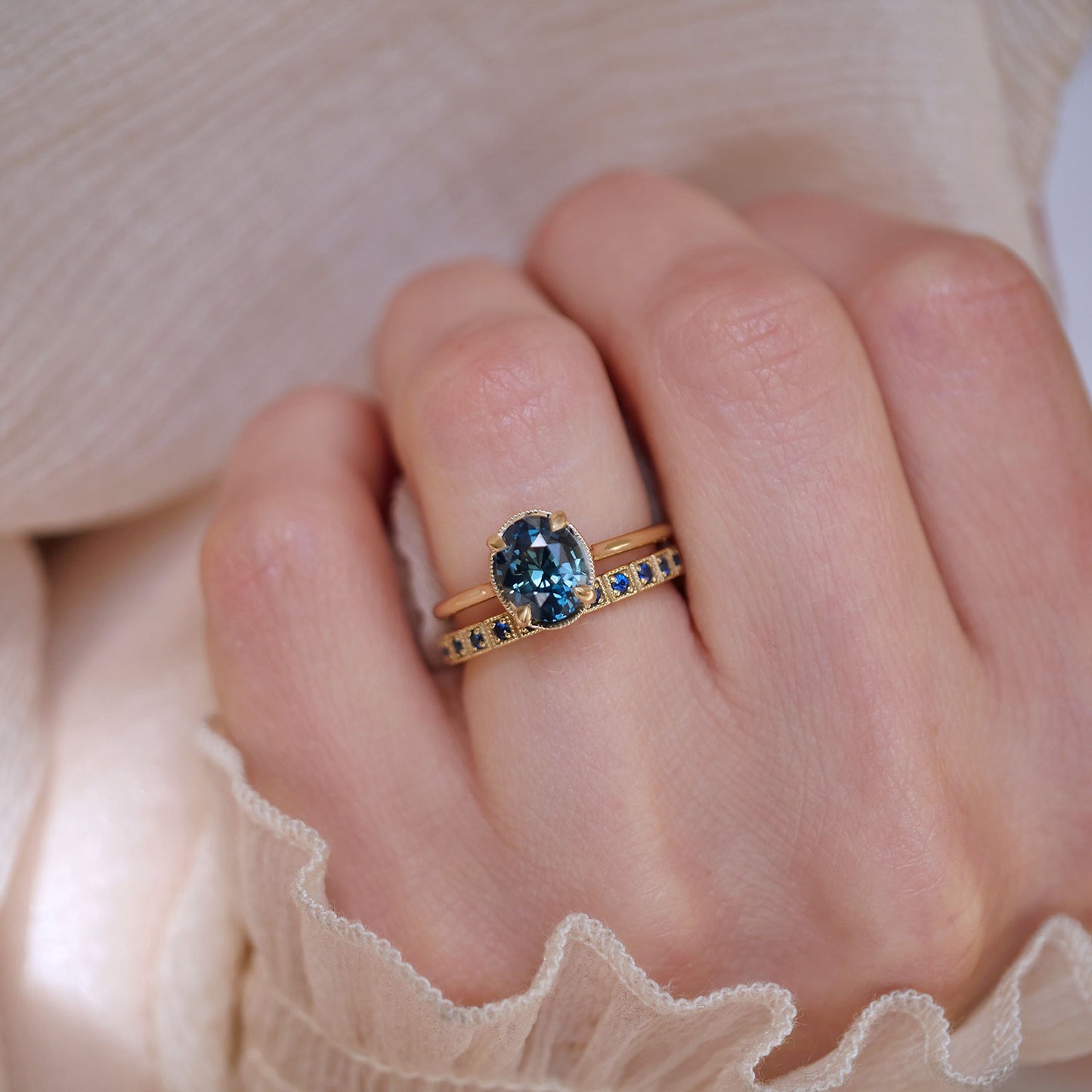 blue sapphire unique vintage engagement ring and stacked notched wedding ring