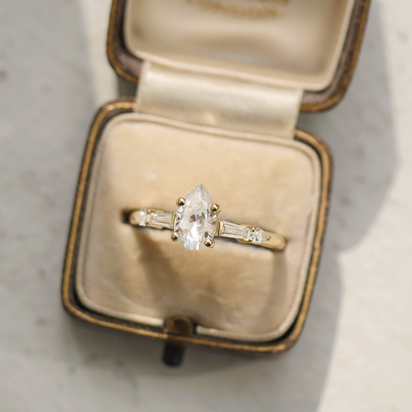 Pear Moissanite and Baguette Engagement Ring