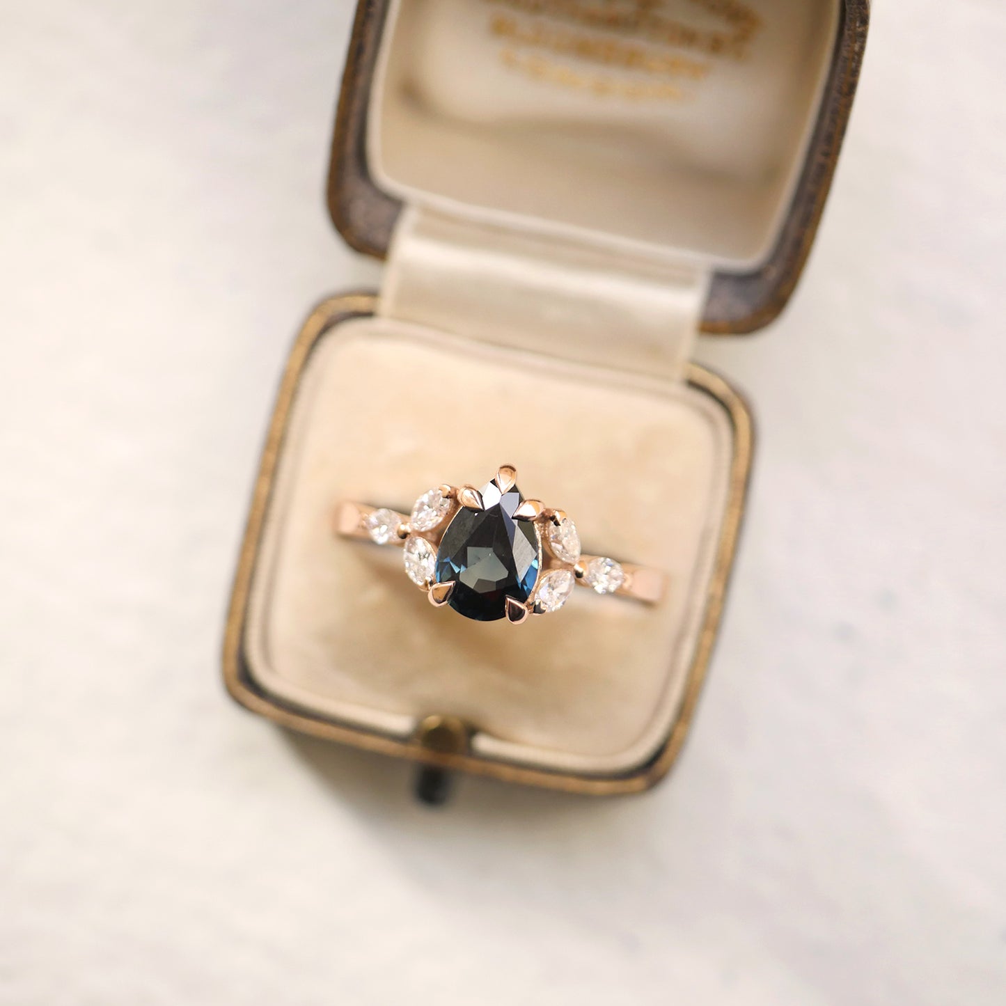 Teal Pear Sapphire and Marquise Rose Gold Ring