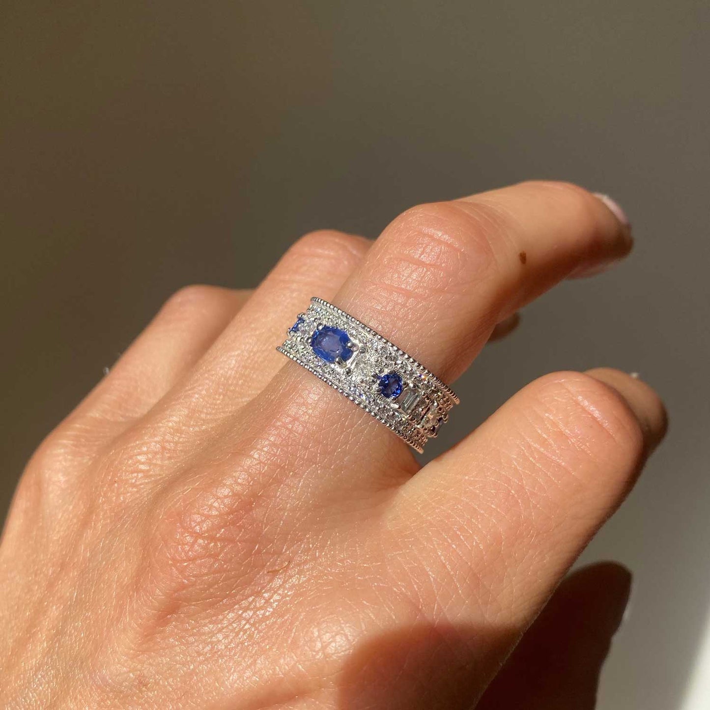 East West Oval Rose Cut Ring with 3/4 diamond pattern & Cylon Sapphires