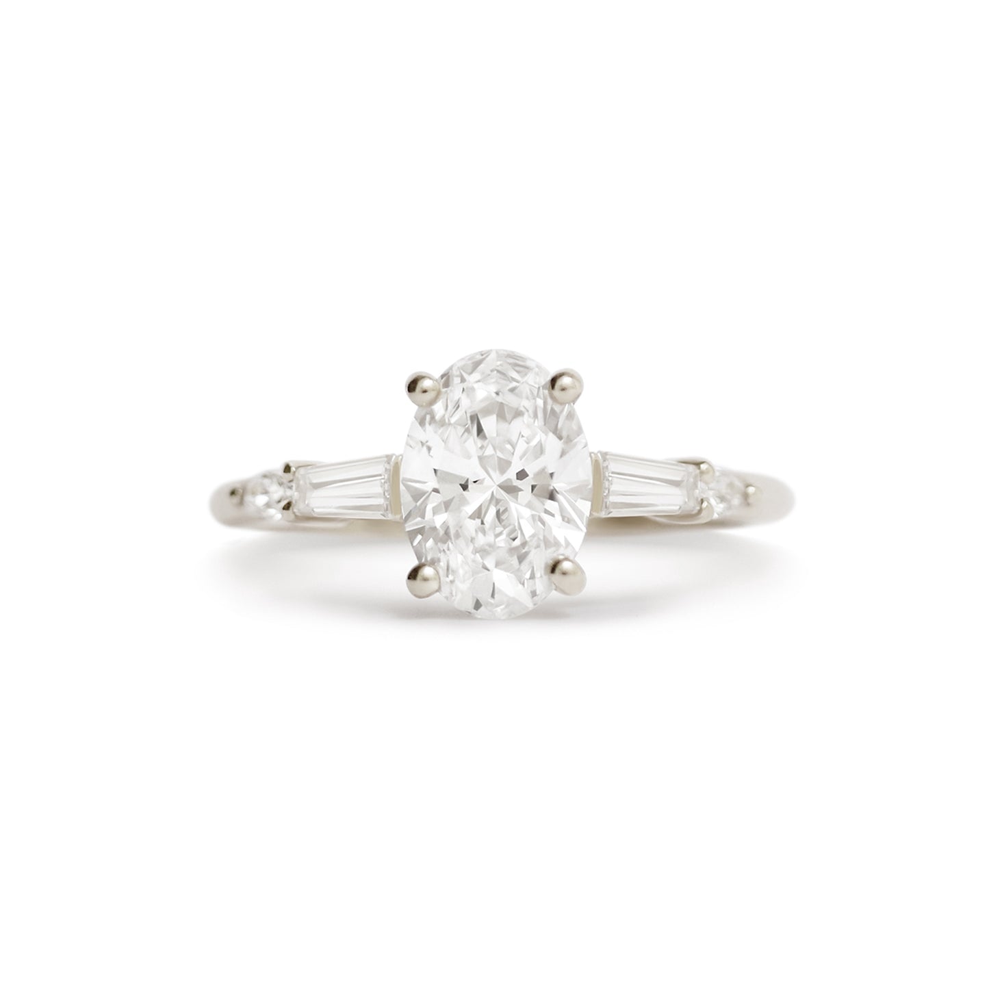 Oval Baguette & Pear Diamond Ring