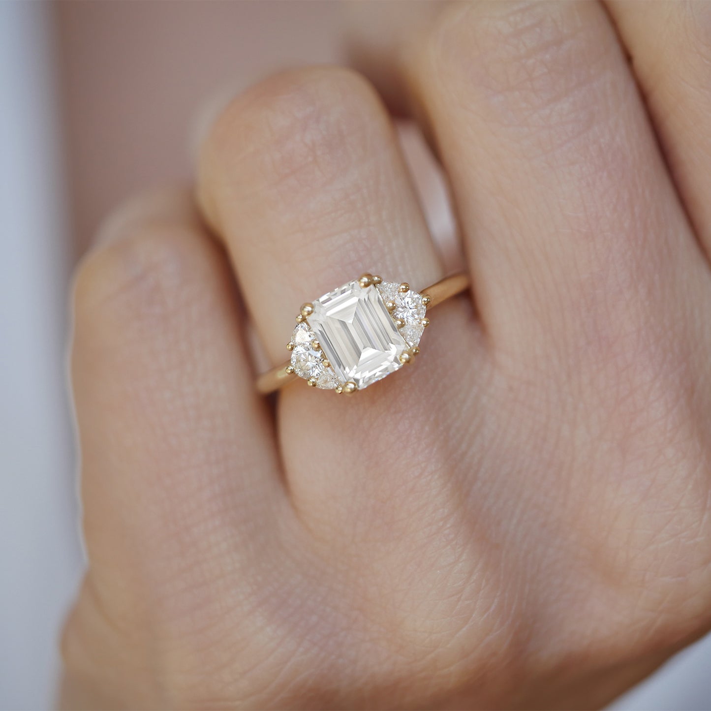 Emerald Moissanite and Trillion Three Stone Ring