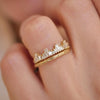 Woman wearing tiara diamond band with floral engraved wedding band. 
