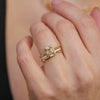 Vintage inspired emerald cut diamond ring with stacked diamond and gold bands