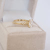 14k yellow gold engagement ring with diamond nature inspired band.