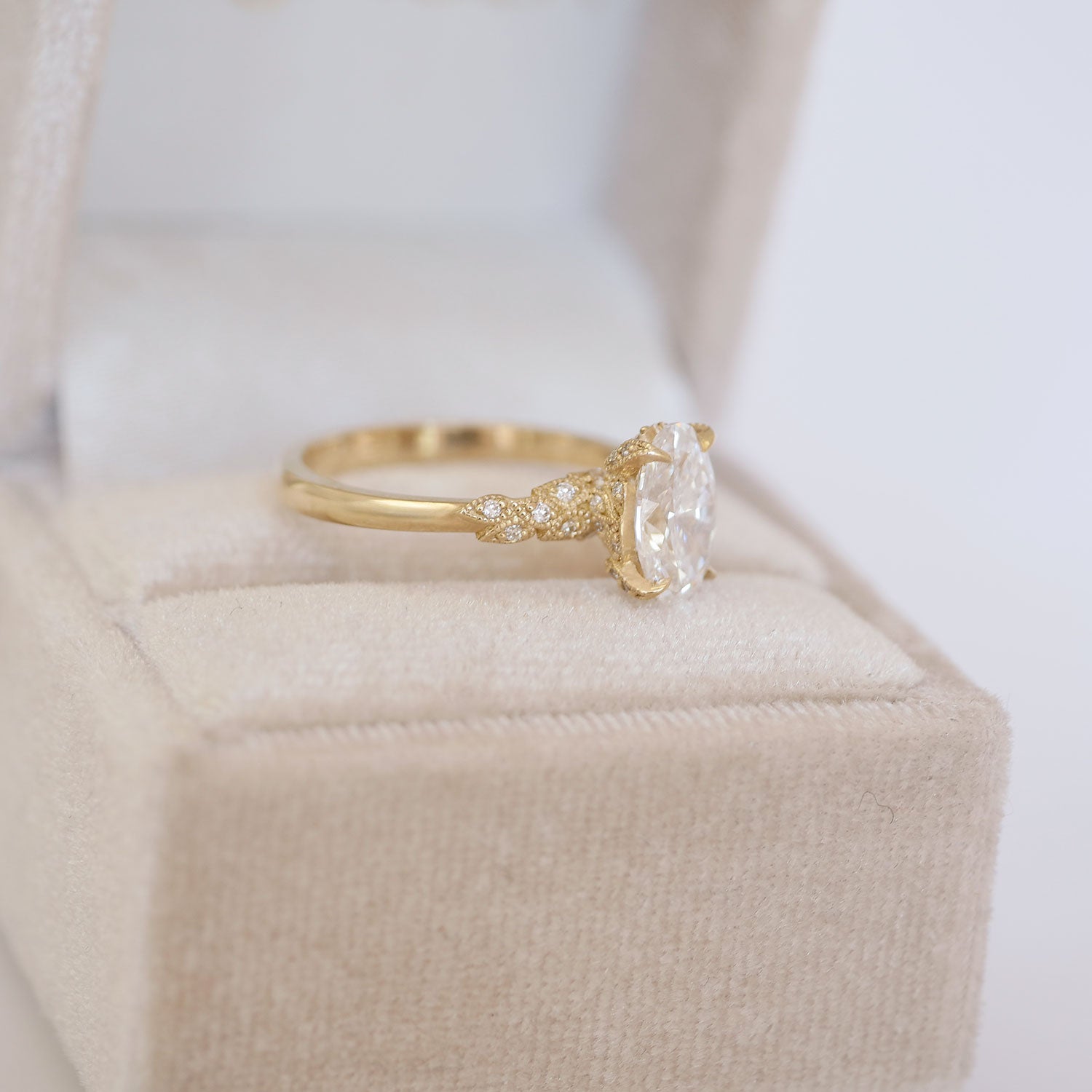 14k yellow gold engagement ring with diamond nature inspired band.