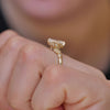 Profile view of a nature inspired engagement ring.