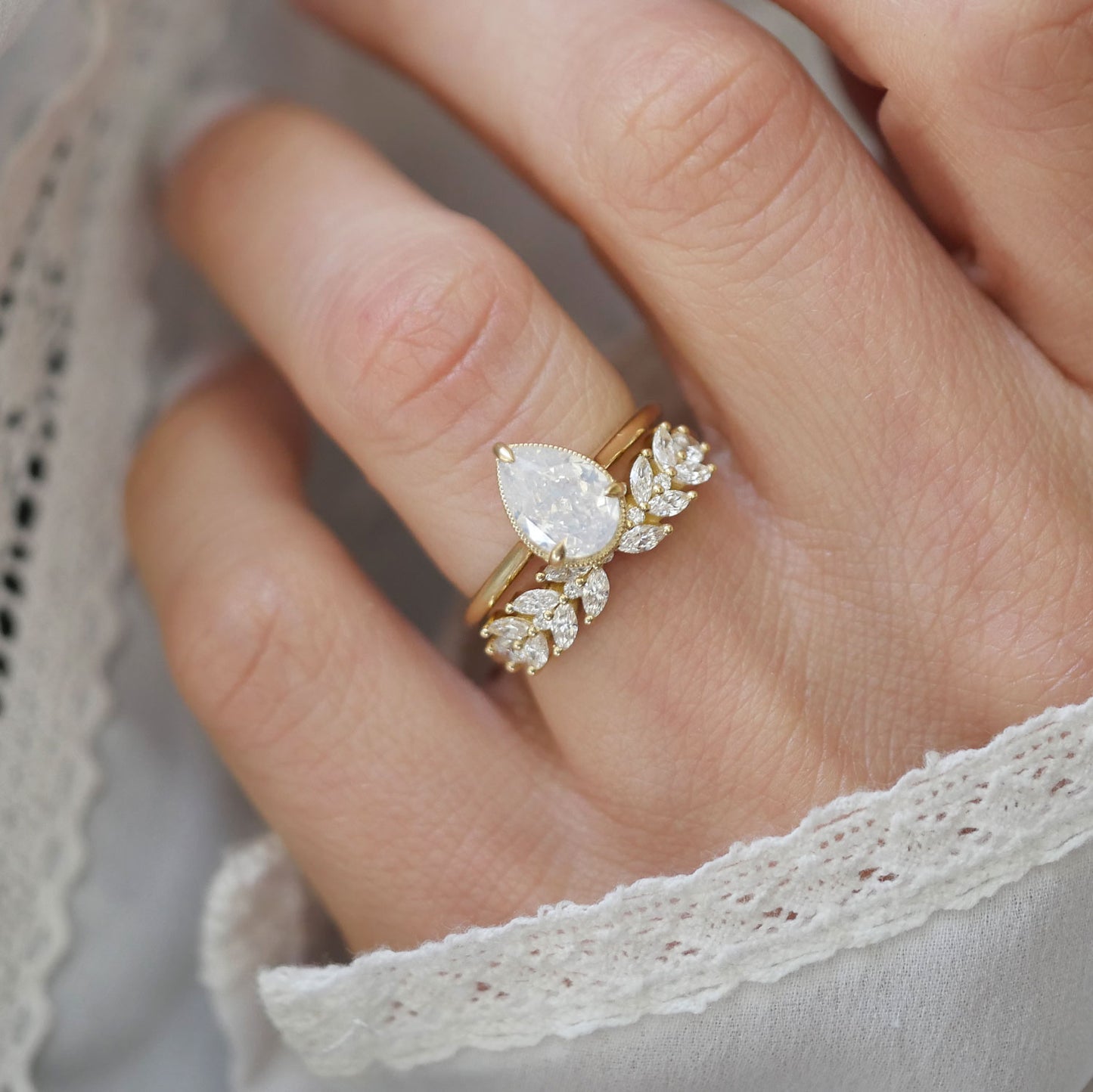 Opalescent Pear Diamond Solitaire Ring