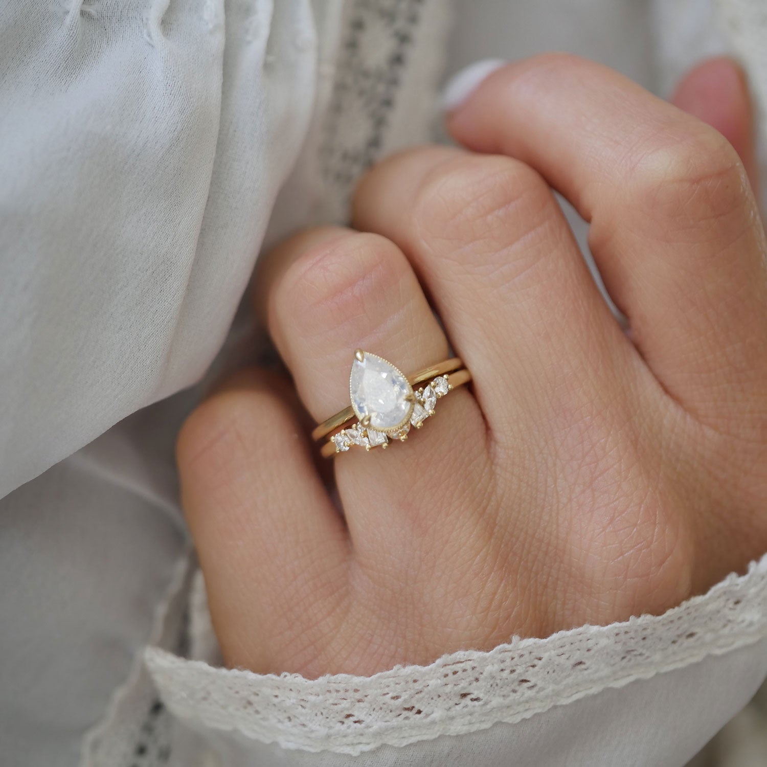 Opalescent Pear Diamond Solitaire Ring