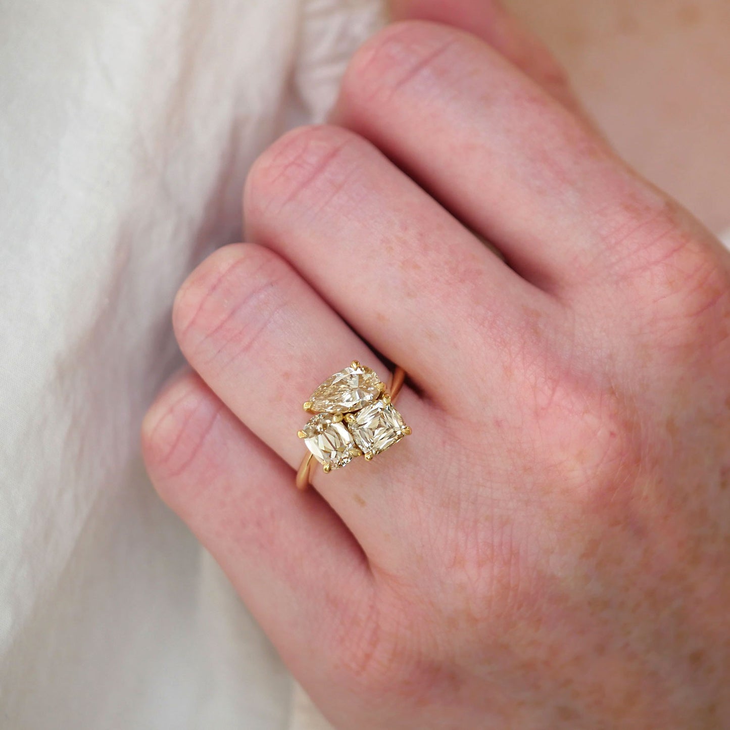 Pear and Cushion Trio Ring