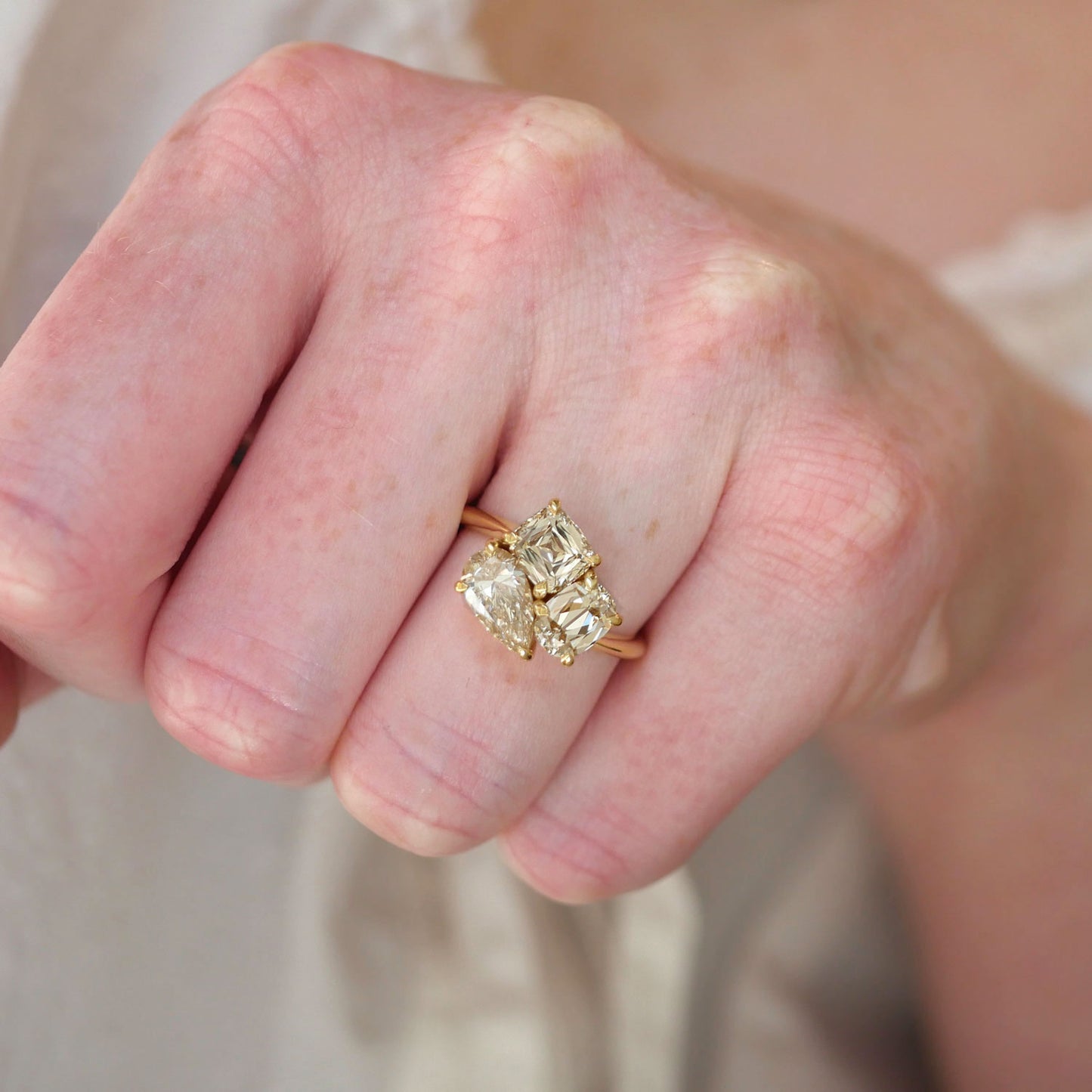 Pear and Cushion Trio Ring