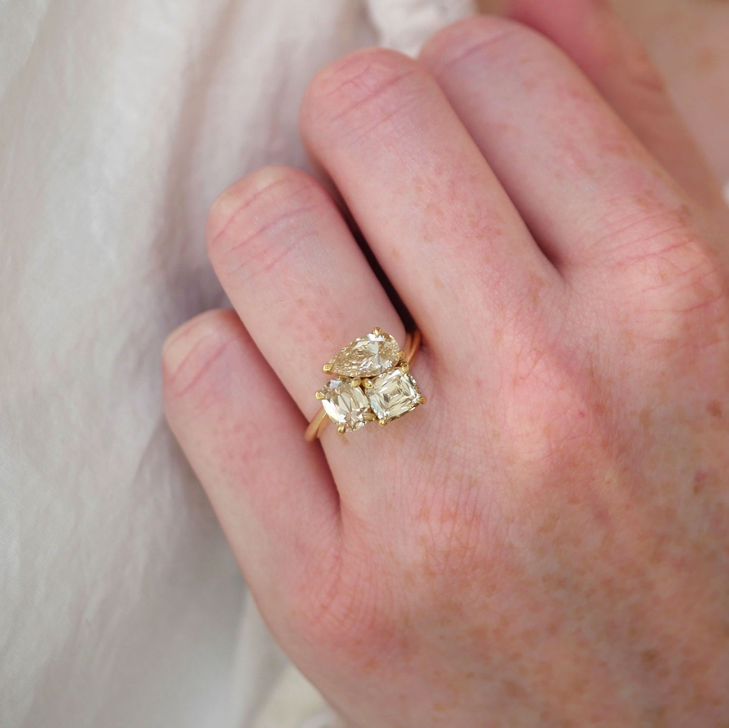 Pear and Cushion Trio Ring