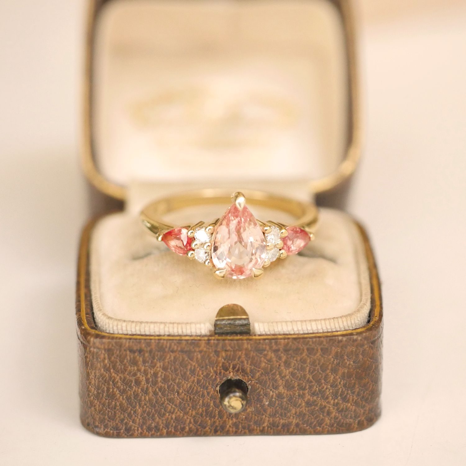 Custom Peach Pear Shaped Sapphire Engagement Ring
