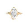 A stunning lab-grown marquise cut diamond sits in a split shank solitaire setting, creating brilliance and elegance of the entire set.