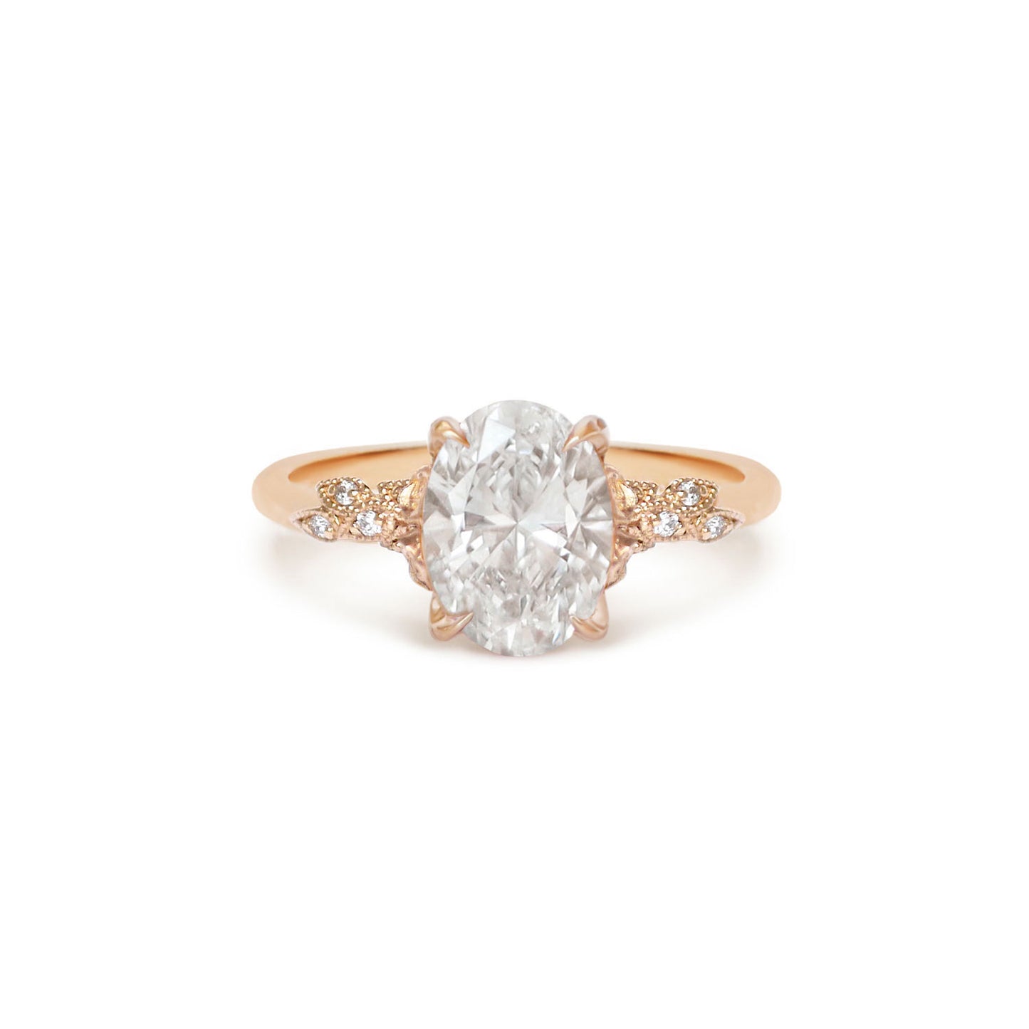 Rose gold ring with a large diamond and smaller diamonds on the band.