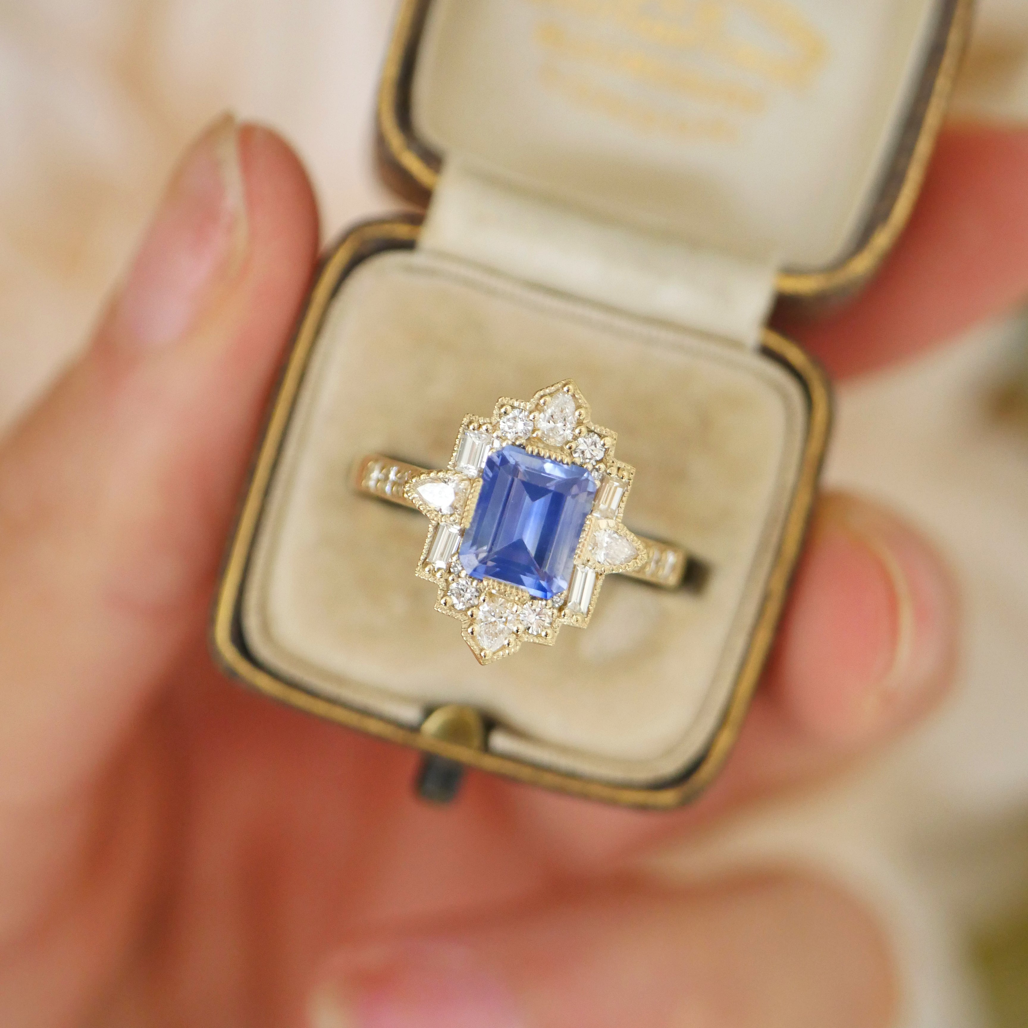 Emerald Blue Sapphire Deco Pear and Emerald Cut Diamond Ring