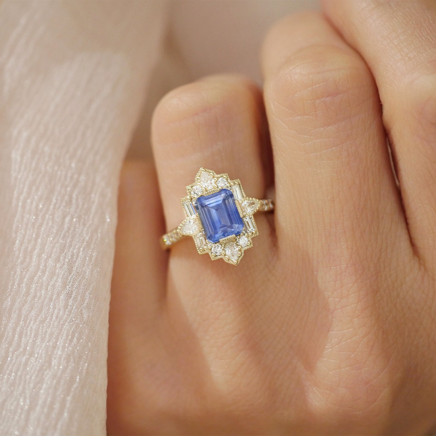 Emerald Blue Sapphire Deco Pear and Emerald Cut Diamond Ring