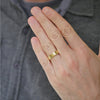 Man wearing 5mm wide wedding band with floral engraving.