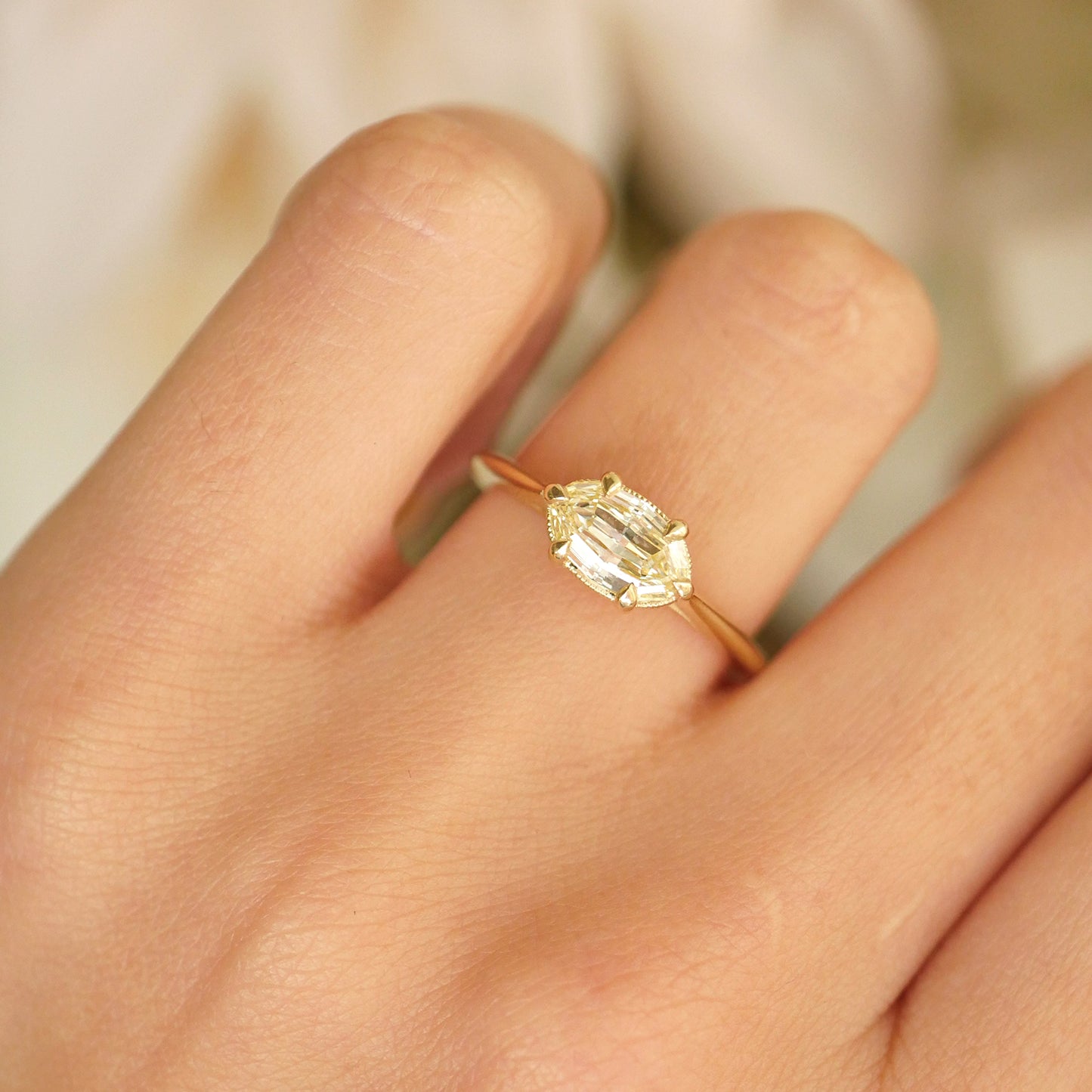 Yellow East West Scissor Oval Solitaire Ring
