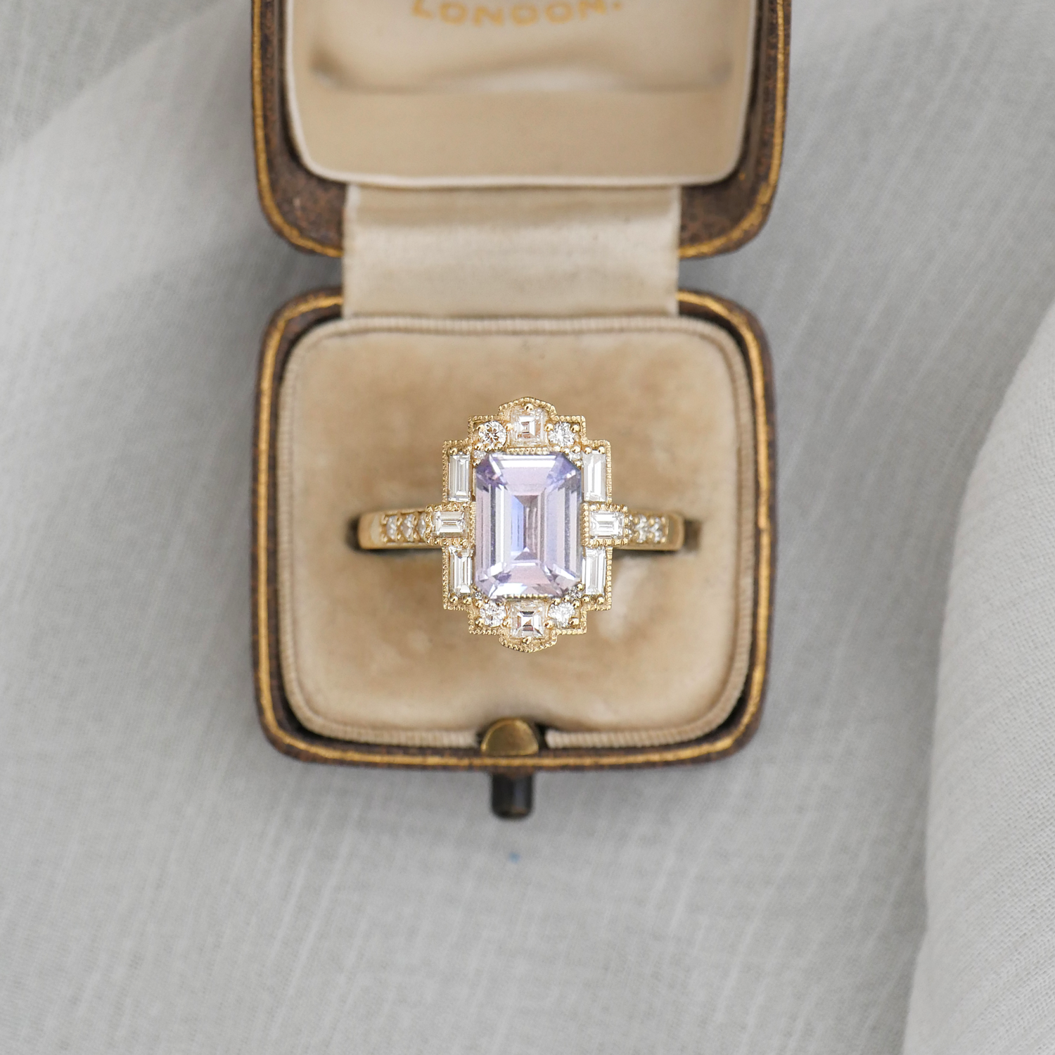 Lavender Emerald Cut Sapphire Deco Halo Diamond Ring