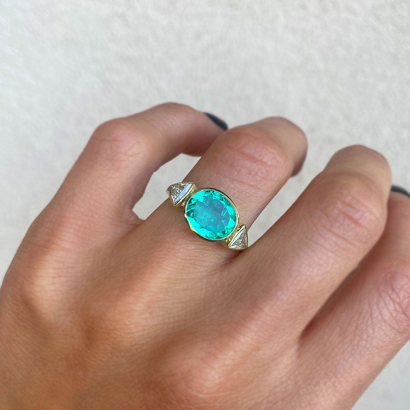 2.43 Carat Oval Colombian Emerald & Trillion Diamond Ring