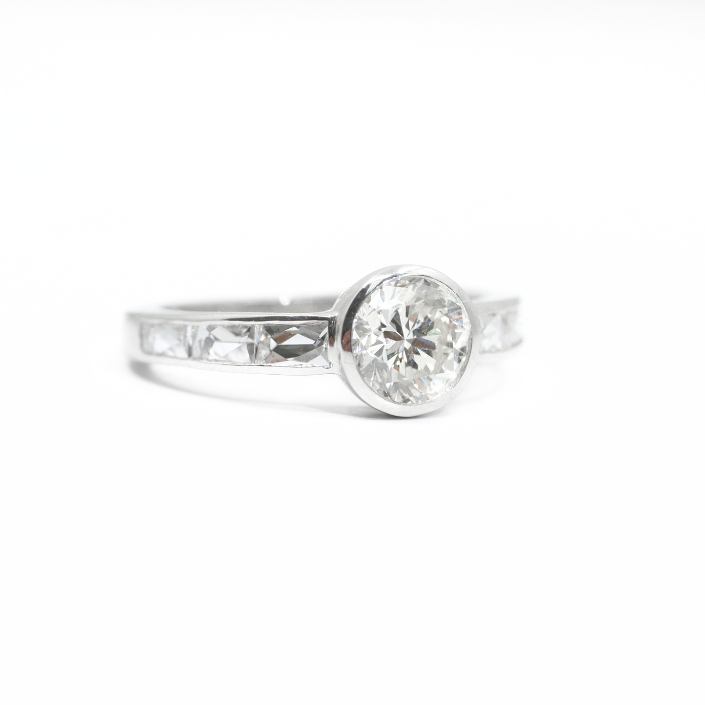 Bezel Set Diamond Ring with French Cut Diamond Accents