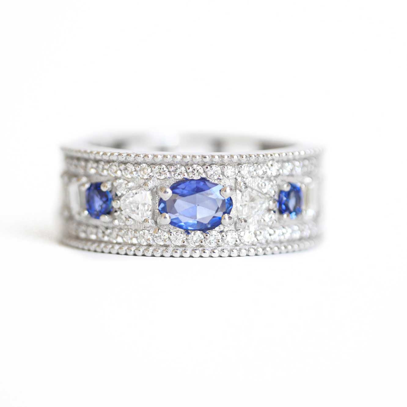 East West Oval Rose Cut Ring with 3/4 diamond pattern & Cylon Sapphires