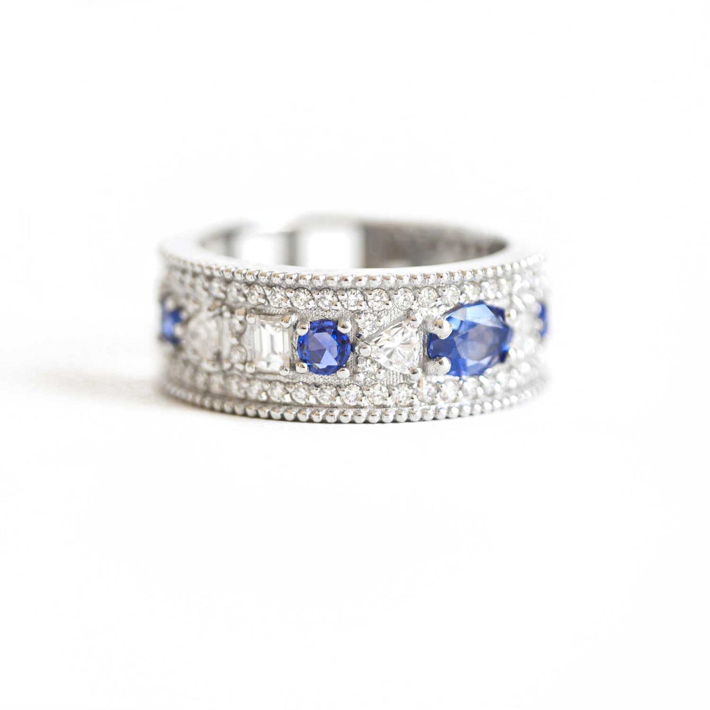 East West Oval Rose Cut Ring with 3/4 diamond pattern & Cylon Sapphires