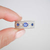 East West Oval Rose Cut Ring with 3/4 diamond pattern & Cylon Sapphires