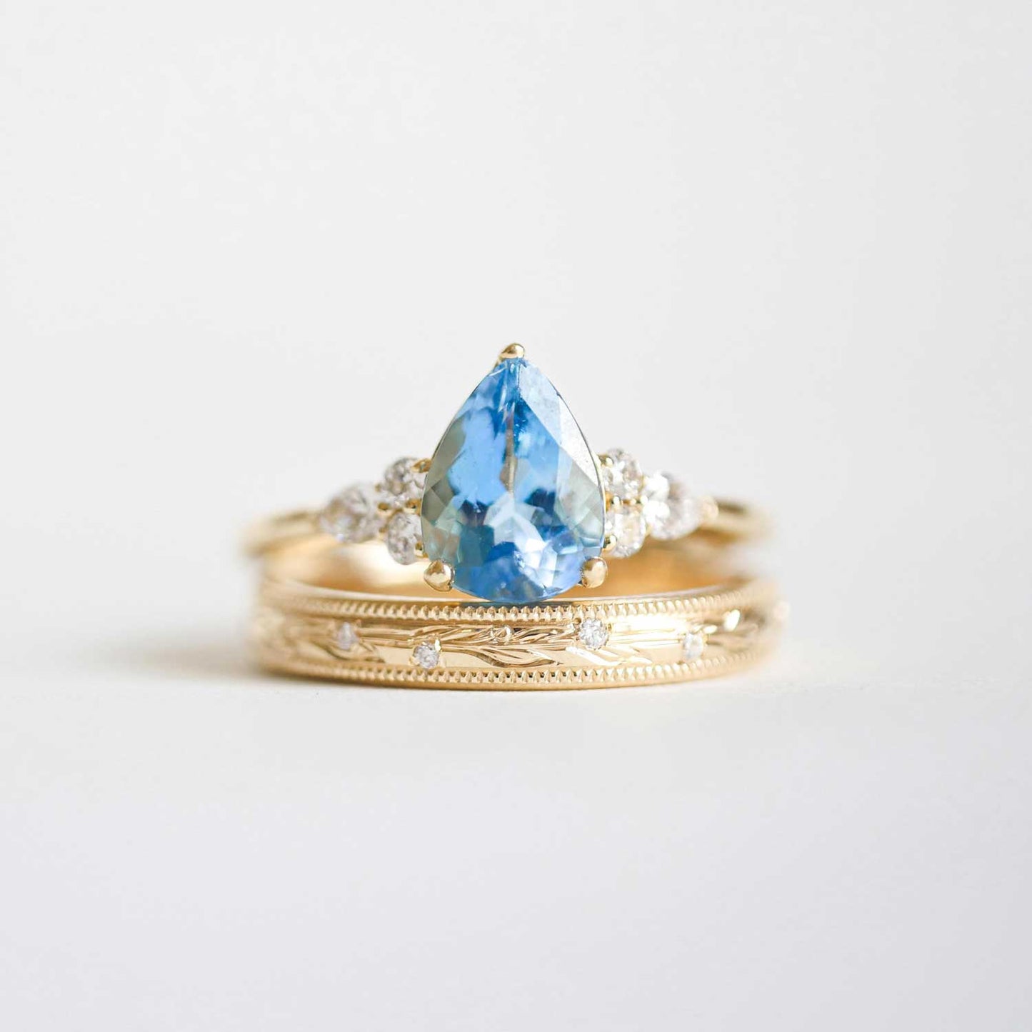 Aquamarine, Pear, and Round Diamond Engagement Ring